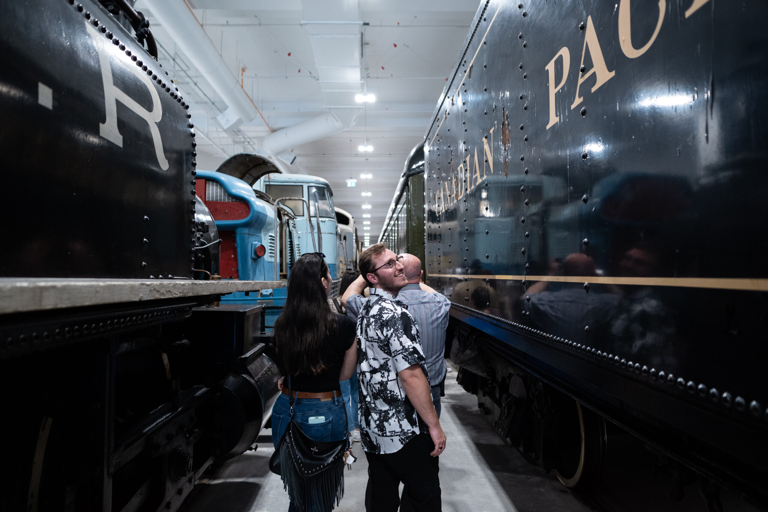 Visitors walk through the Rolling Stock Collection at the Ingenium Centre.