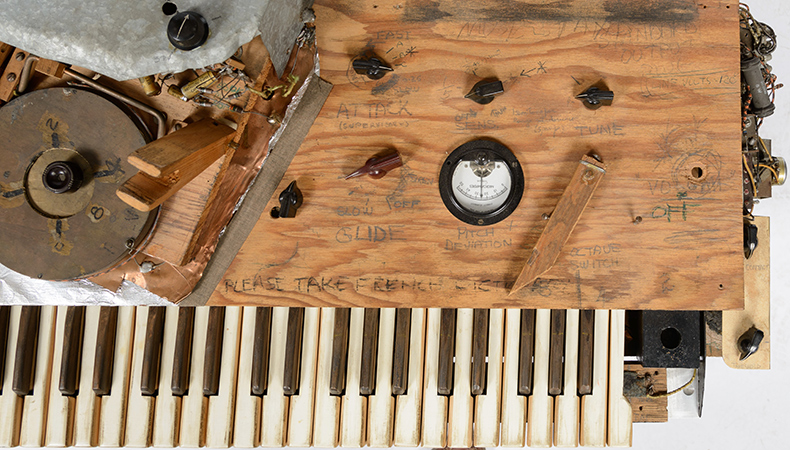 An overhead view of the keys and main controls of the Electronic Sackbut synthesizer, set against a white background.