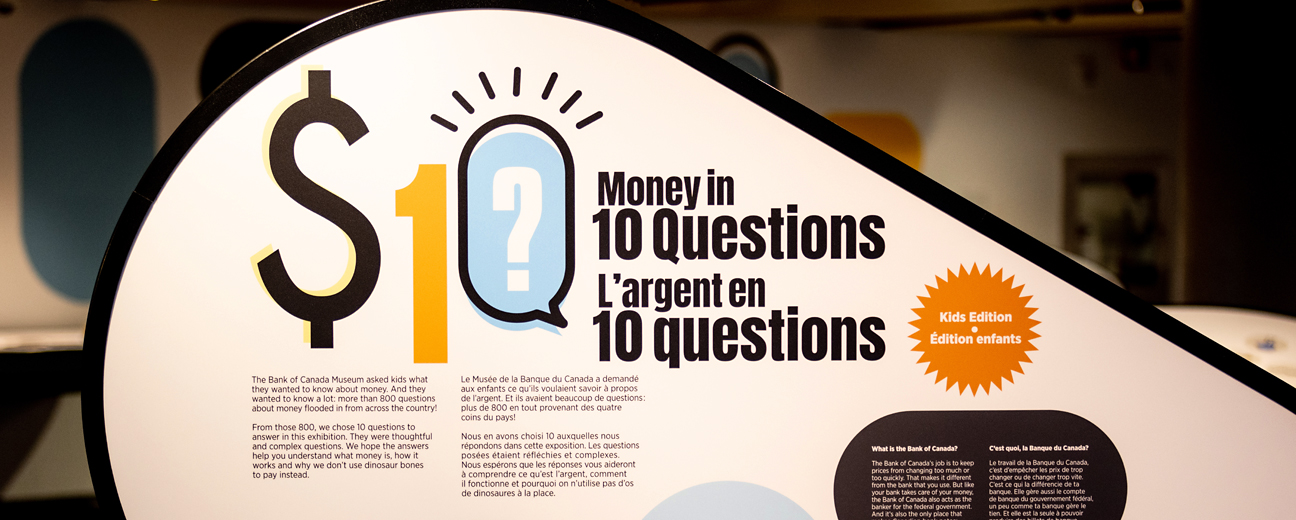 Money in 10 questions in large text on an exhibit sign.